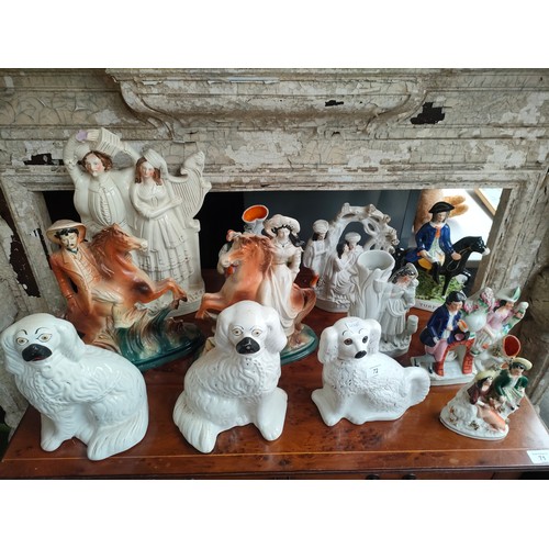 72 - A Large collection of Victorian Staffordshire flat back figurines