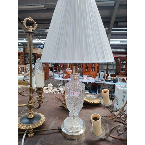 381A - Selection of 1900s brass ceiling lights, 3 way brass light together with crystal lamp