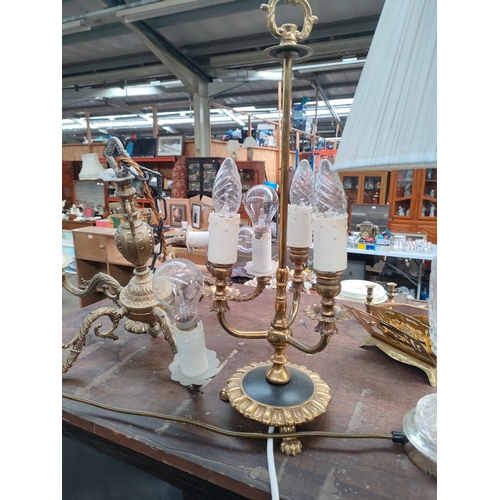 381A - Selection of 1900s brass ceiling lights, 3 way brass light together with crystal lamp