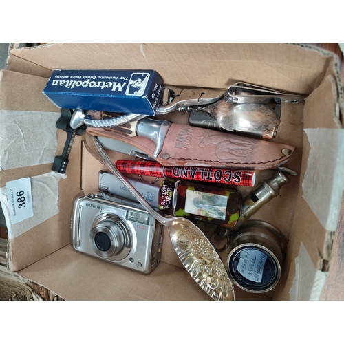 386 - Small box of miscellaneous items includes collectable lighters, Nintendo Ds, camera, trench art etc