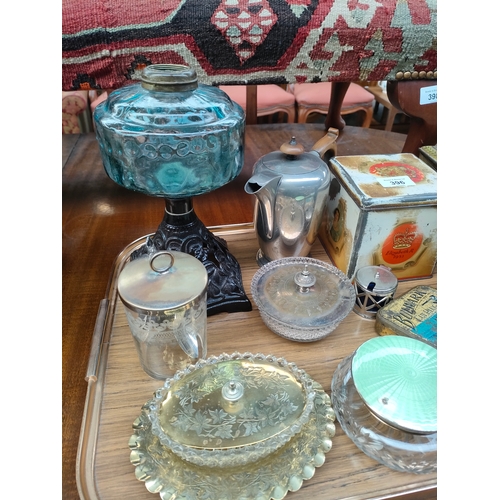 396 - A Tray of collectables includes Victorian oil lamp base, vintage tins etc