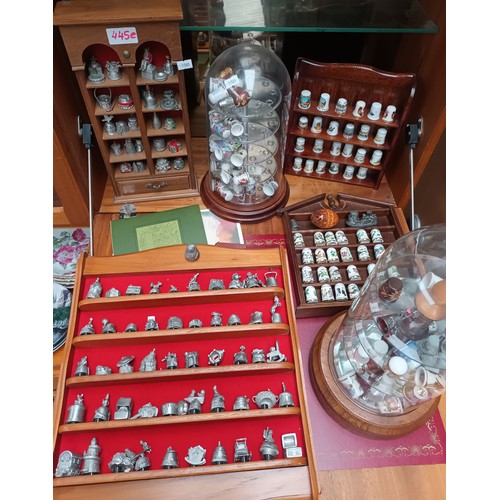 445E - Large collection of thimbles to include pewter, display holders etc