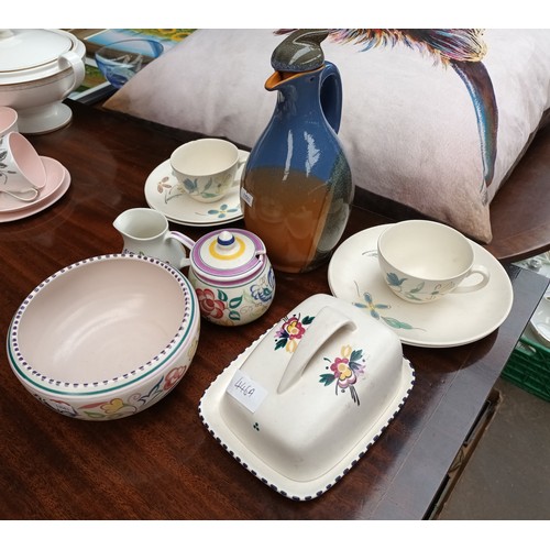 446A - A lot to include Poole Pottery cup/saucers, butter dish and bowl