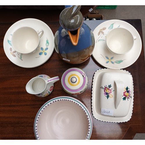 446A - A lot to include Poole Pottery cup/saucers, butter dish and bowl