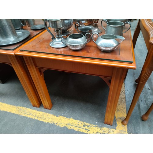 419 - A pair of side tables with glass tops