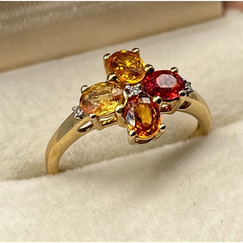 45 - 10ct yellow gold ladies ring set with four various gem stones with three diamonds. [Ring size P] [2.... 