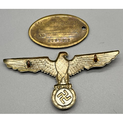 51 - German Nazi Summer Tunic Eagle badge. Together with a German Gestapo I.D. Disc.