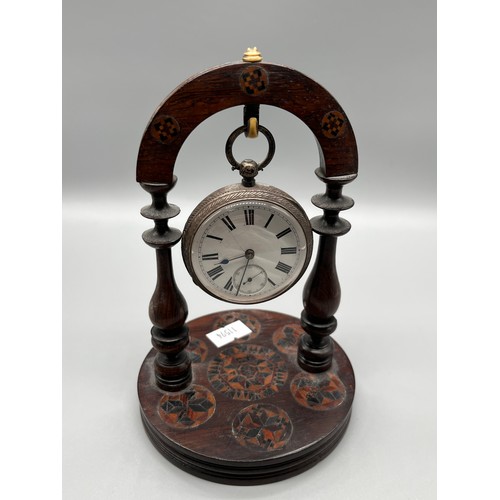 534 - Antique London silver pocket watch together with antique pocket watch stand detailed with marquetry ... 