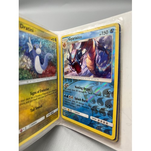 279 - Two pocket albums of pokemon cards to include Charizard, Gyrados, Weezing, Xerneas, Lugia Charmeleon... 