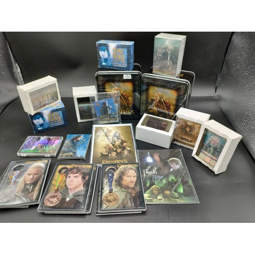 110 - Large selection of Lord of the Rings collectors cards, medals and photographs