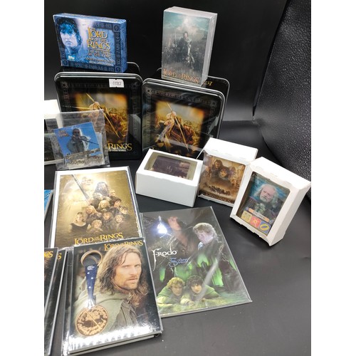 110 - Large selection of Lord of the Rings collectors cards, medals and photographs