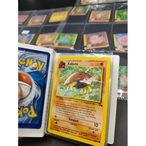 112 - Small album of various Pokémon cards and five sleeves of Pokémon Artbox stickers