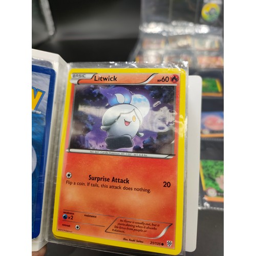 112 - Small album of various Pokémon cards and five sleeves of Pokémon Artbox stickers