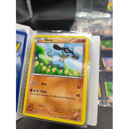 112 - Small album of various Pokémon cards and five sleeves of Pokémon Artbox stickers