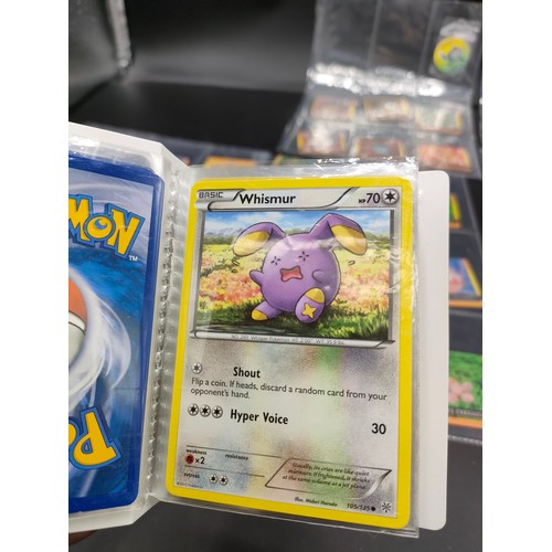 112 - Small album of various Pokémon cards and five sleeves of Pokémon Artbox stickers