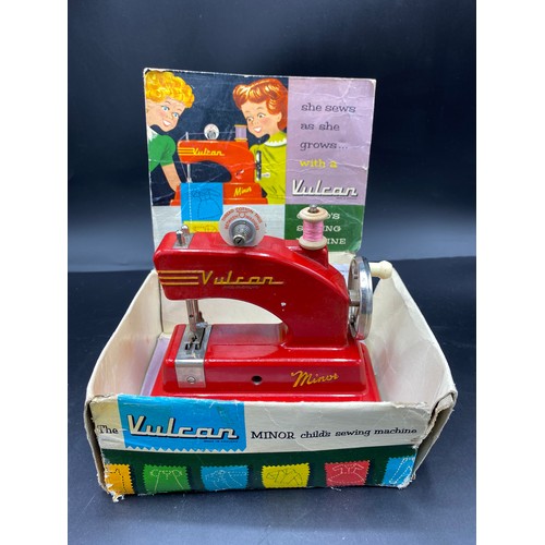 154 - Vintage Vulcan Childs sewing machine with original box.