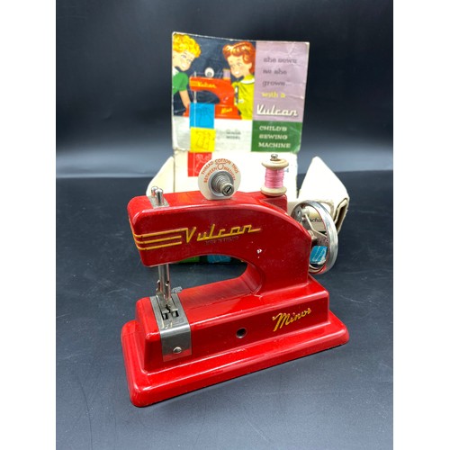 154 - Vintage Vulcan Childs sewing machine with original box.