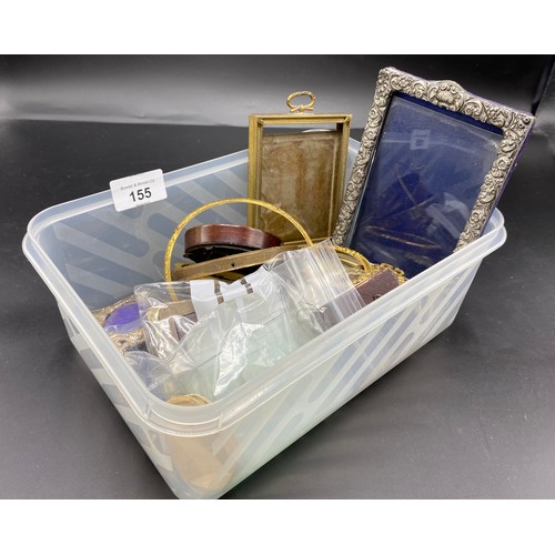 155 - A Box containing silver marked photo frames and antique miniature photo frames