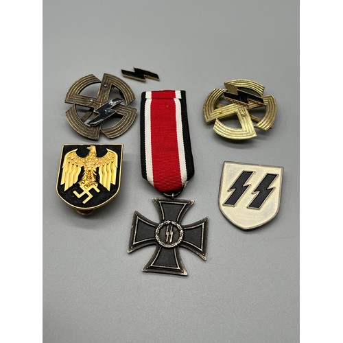 162 - A Selection of reproduction Military German badges.