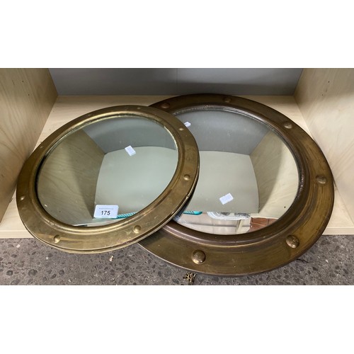 175 - Two antique/ vintage brass framed convex mirrors.