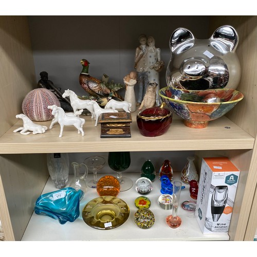 177 - Two shelves of collectables to include art glass paperweights, Horse figurines and various odds.