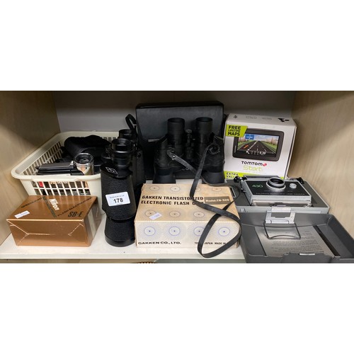 178 - A Shelf of cameras and binoculars to include Cobra Model 750 binoculars, Tom tom sat nav, Polaroid A... 