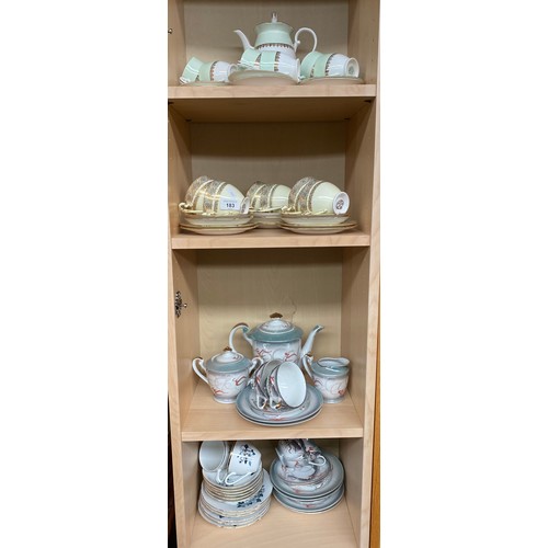 183 - Four shelves of vintage tea sets to include Chinese Dragon design and Geisha tea service & two Royal... 