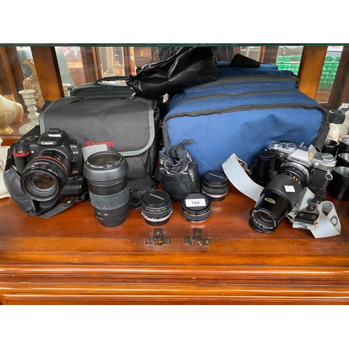 192 - A Shelf of camera items to include Canon EOS 350D Digital camera, Jessops Skylight 1a filter 58mm le... 