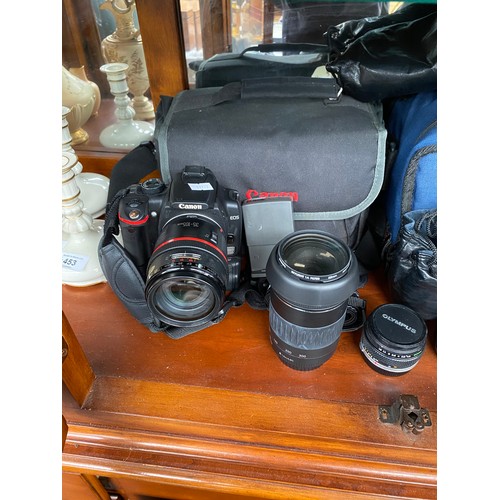 192 - A Shelf of camera items to include Canon EOS 350D Digital camera, Jessops Skylight 1a filter 58mm le... 