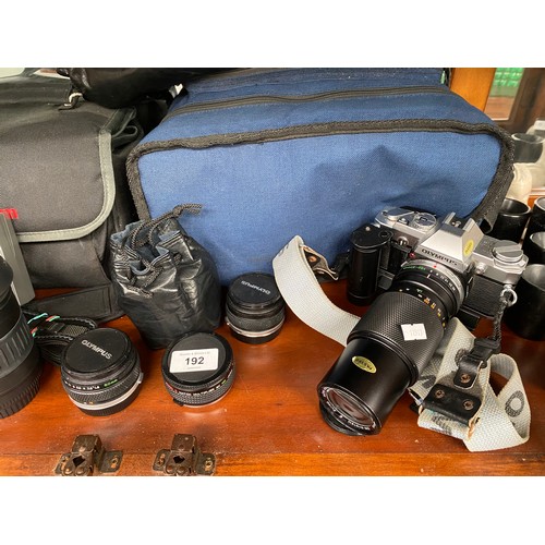 192 - A Shelf of camera items to include Canon EOS 350D Digital camera, Jessops Skylight 1a filter 58mm le... 