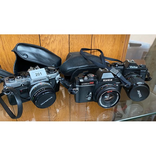 201 - A Shelf of cameras to include Pentax K2, Olympus OM10, Konica Autoreflex TC and Vivitar V3800N.