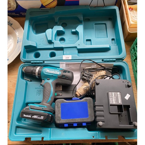 209 - Boxed Makita LXT Cordless drill with charger and draper drill bits.