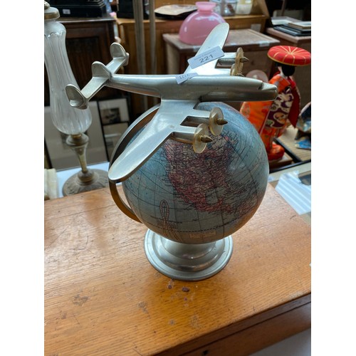 221 - 1920's desk top globe fitted with a metal plane model. 12inch globe made by Weber Costello Co.