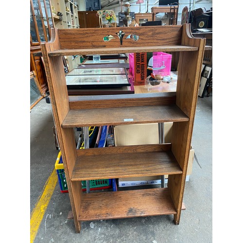 230 - Arts and crafts era four tier oak bookcase.