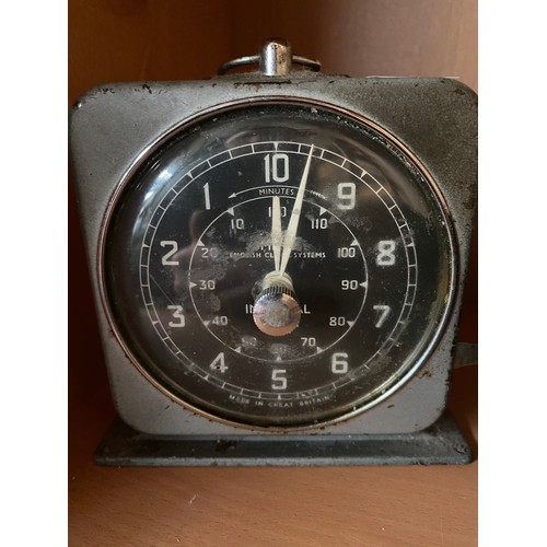 279 - Antique bulkhead style clock fitted within a bakelite body- in a working condition. Together with a ... 