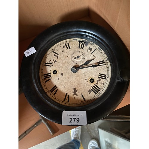 279 - Antique bulkhead style clock fitted within a bakelite body- in a working condition. Together with a ... 