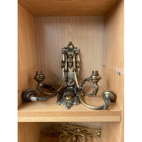 283 - A Collection of antique regency style ornate brass  wall lights.