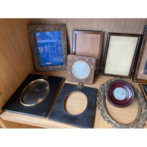 287 - A Shelf of antique photoframes of various sizes