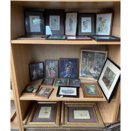 291 - Three shelves of art work prints and engravings to include Mabel Lucie Attwell prints, Caricature of... 