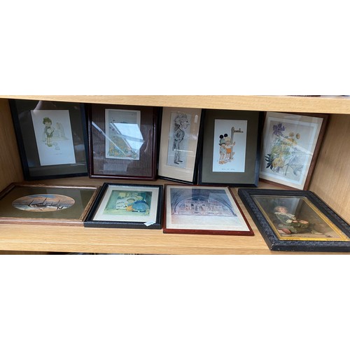 291 - Three shelves of art work prints and engravings to include Mabel Lucie Attwell prints, Caricature of... 