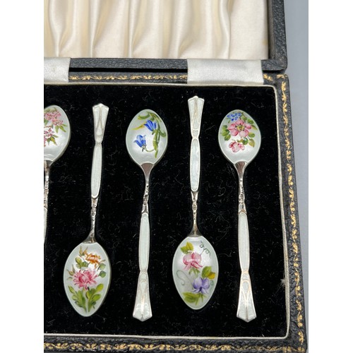 6 - A Boxed set of 6 Birmingham silver and enamel flower design tea spoons. Produced by Henry Clifford D... 