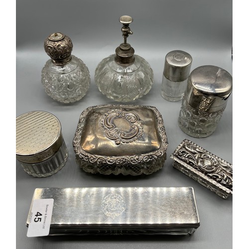 45 - A Collection of silver marked dressing table lidded preserve pots and perfume bottles.