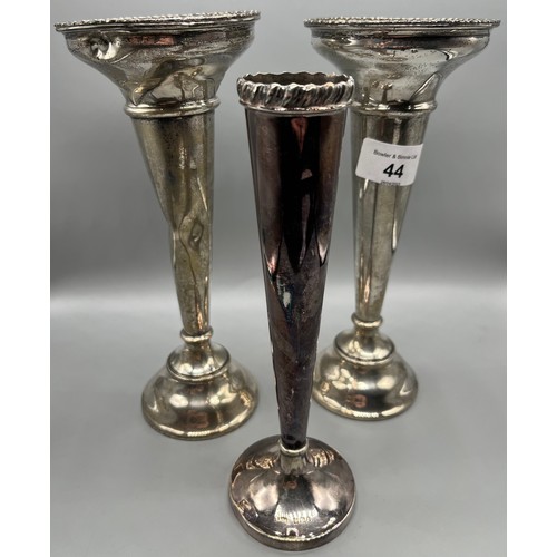 44 - A Pair of Birmingham silver tall and weighted bud vases, Together with a tall and weighted Sheffield... 