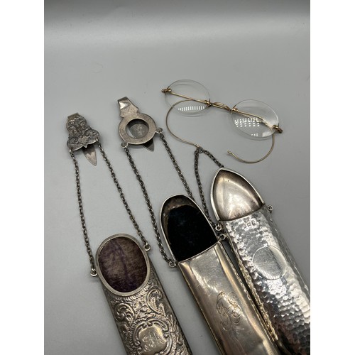 32 - Three Birmingham silver spectacle holders. Together with gilt metal spectacles.