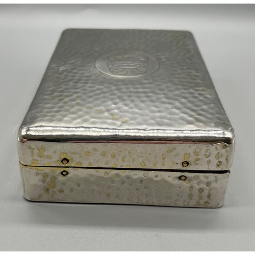 28 - London Silver hammered effect manicure box produced by William Comyns & Sons. Together with an ornat... 