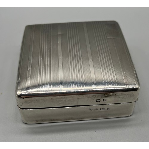 27 - Birmingham silver cigarette box together with an ornate Birmingham silver vesta case. [Box-3.2x8.6x8... 