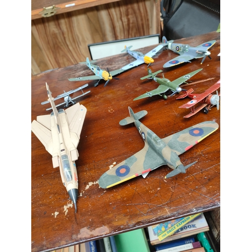 144A - A selection of die cast iron plane model and others to include war planes and other