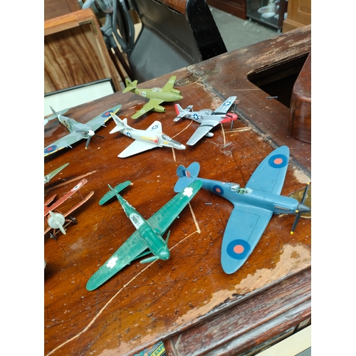 144A - A selection of die cast iron plane model and others to include war planes and other