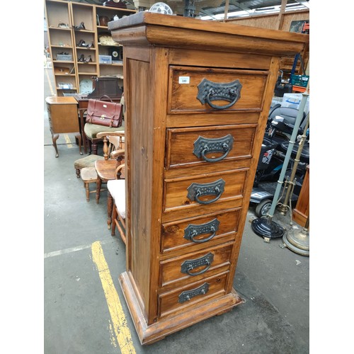 340 - Contemporary Mexican pine tall 6 drawer chest, fitted with wrought iron swing handles.