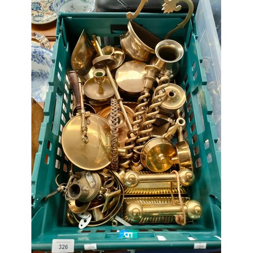 326 - A Crate of brass wares to include fire dogs, candle holders, bronze cold painted bird sculpture and ... 